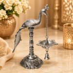 Handcrafted Silver Finish Peacock Hanging Diya with Bell – Decorative Oil Lamp for Pooja & Home Temple