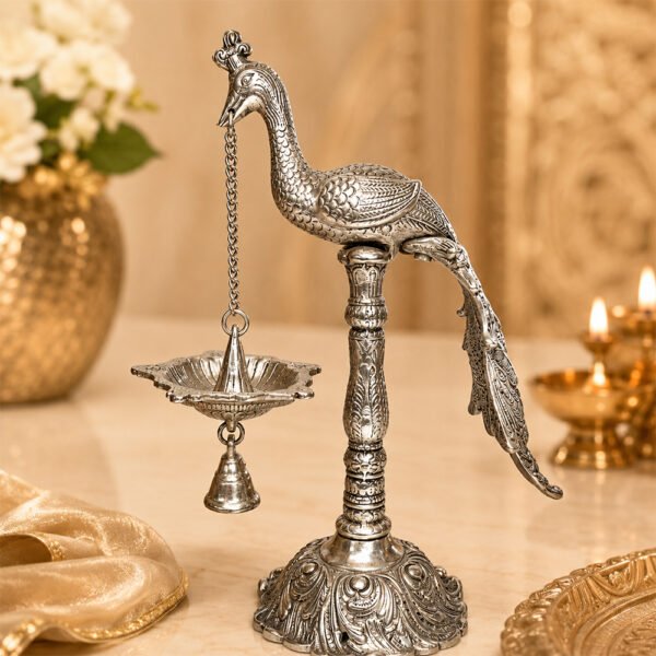 Handcrafted Silver Finish Peacock Hanging Diya with Bell – Decorative Oil Lamp for Pooja & Home Temple