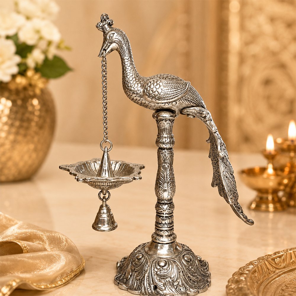 Handcrafted Silver Finish Peacock Hanging Diya with Bell – Decorative Oil Lamp for Pooja & Home Temple